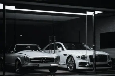 A car on display in a dealership showroom